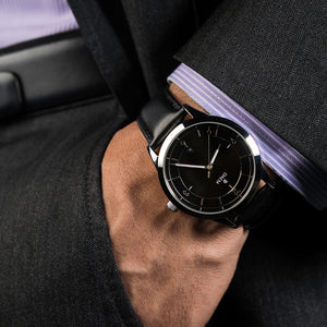 DAEM Sterling x Black leather watch on wrist